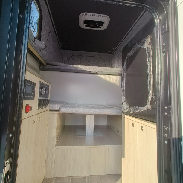 East / West Seating w / Dual Slideout Storage